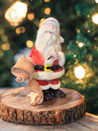 Vintage Ceramic Santa Claus Figurine with Scroll